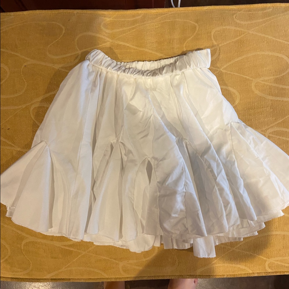 White flowy skirt… not sure what brand it is or size but I think S/M